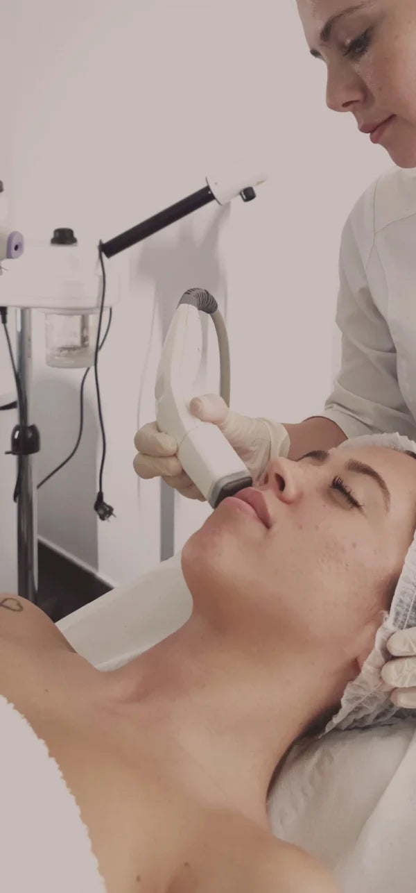 a woman getting a face massage